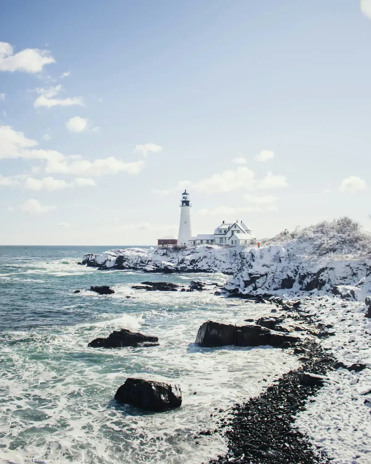 Photo by Adam Bixby - Portland Head Lighthouse, Cape Elizabeth, United States - winter on Unsplash