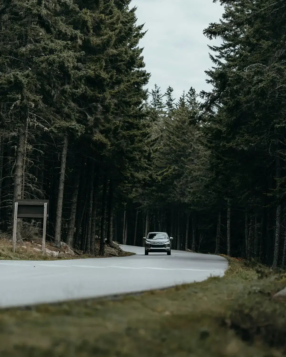 Photo by Clay Banks- car on road Unsplash