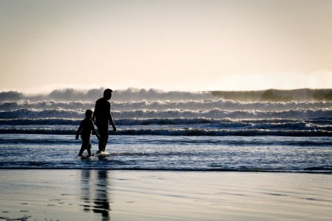 Dad and Son on Beach with waves